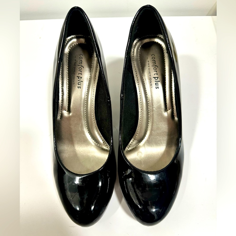Black closed toe, low stiletto heel. Nearly new
